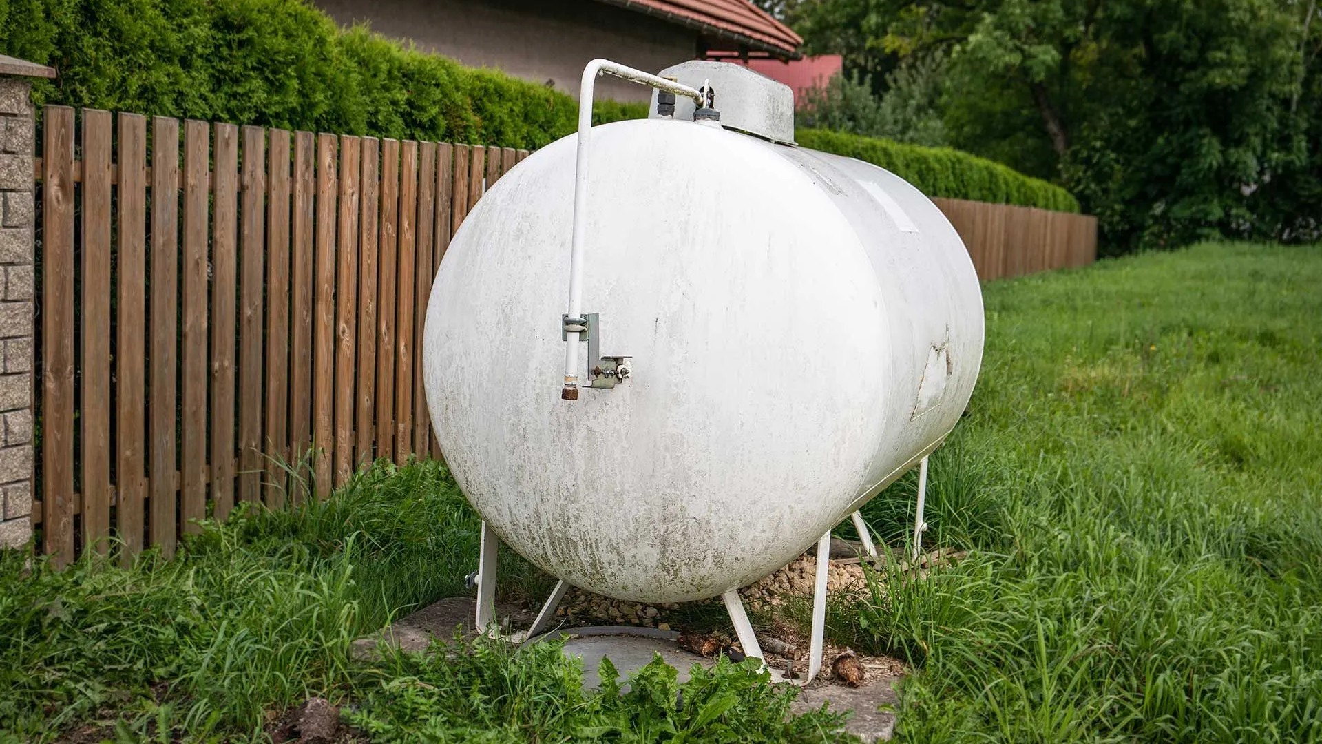 Propane and Gas Services - Propane Tank by Fence Propane and Gas Services - Propane Tank by Fence